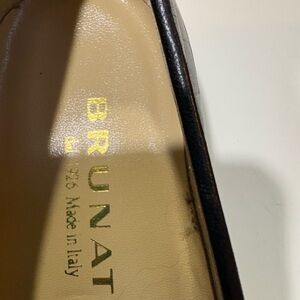 Woman’s black Italian leather shoes in size 11.